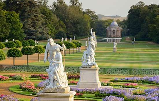 Aveniue style view of the gardens and statues in Wrest Park